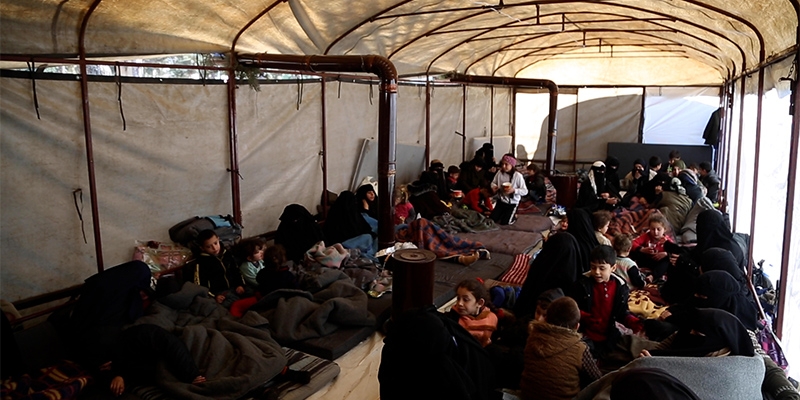Syria, families gather in a tent after the devastating earthquake in Syria